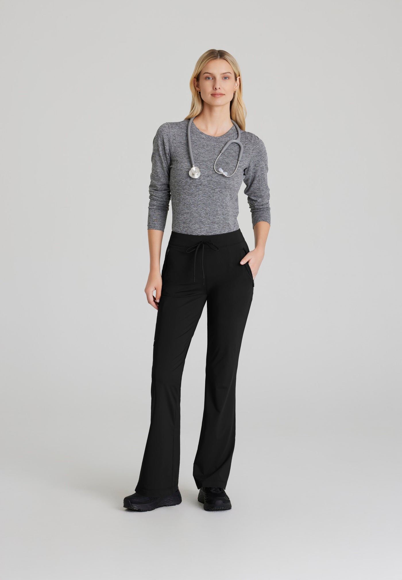 SKP656 Skechers Slip-Ins scrub pant in black. flattering style. Flare pant. stretchable fabric. figs medical scrubs. front image