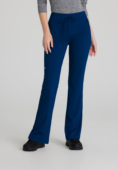 SKP656 Skechers Slip-Ins scrub pant in navy. flattering style. Flare pant. stretchable fabric. figs medical scrubs. close up image