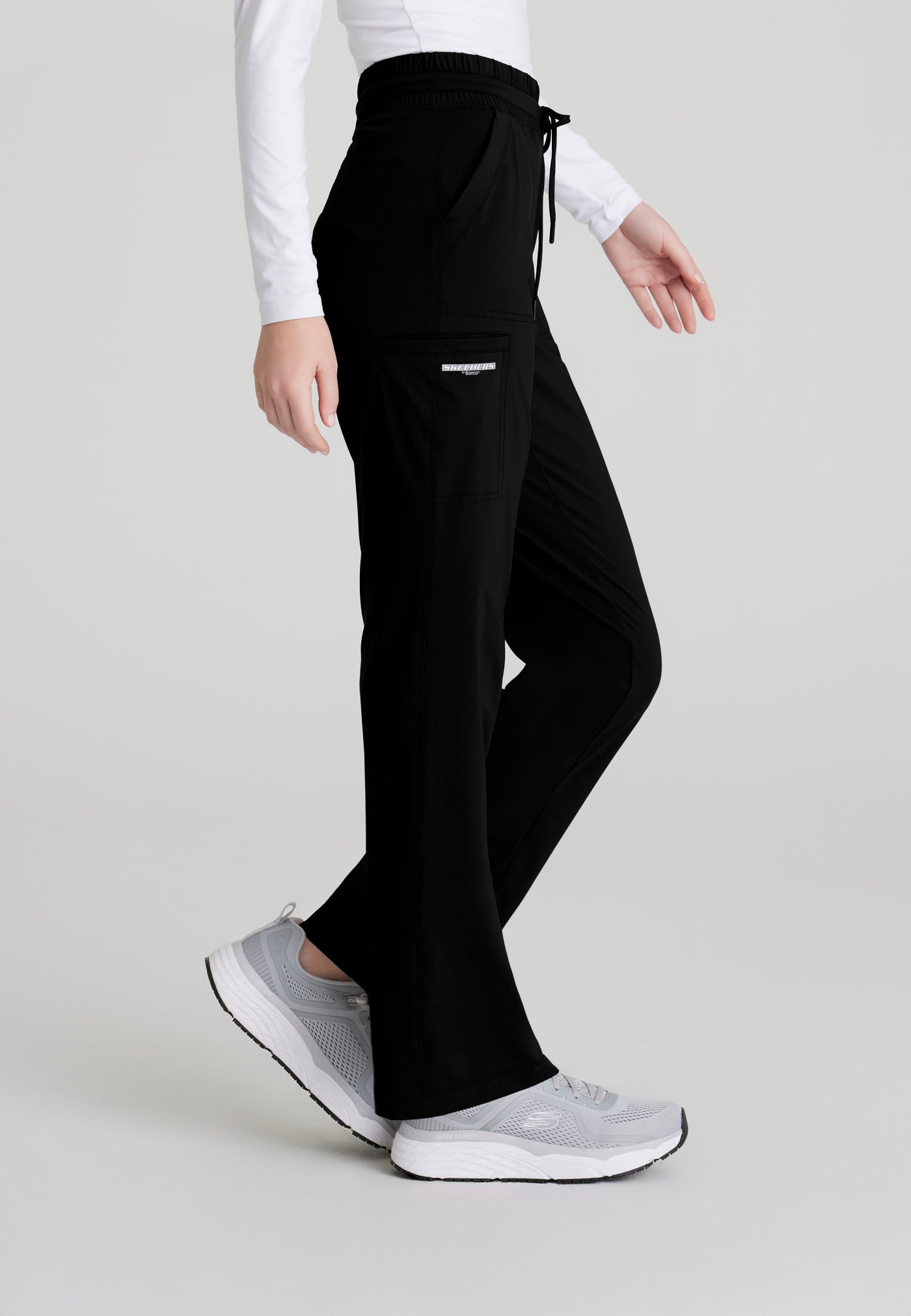 SKP668 Skechers Slip-Ins scrub pant in black. slim leg. stretchable fabric. figs medical scrubs. side image