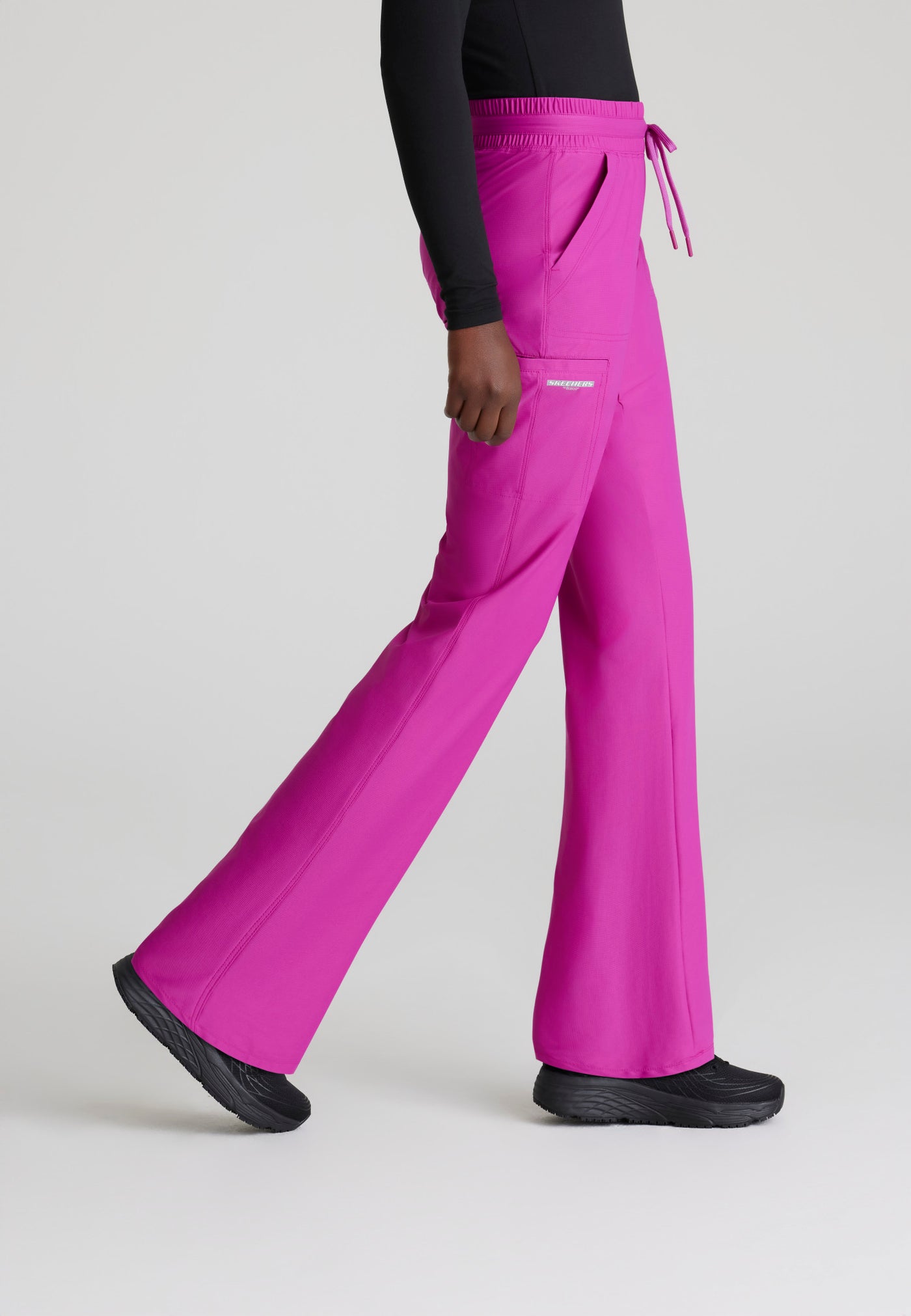 SKP668 Skechers Slip-Ins scrub pant in deep magenta. slim leg. stretchable fabric. medical scrub pants. side image