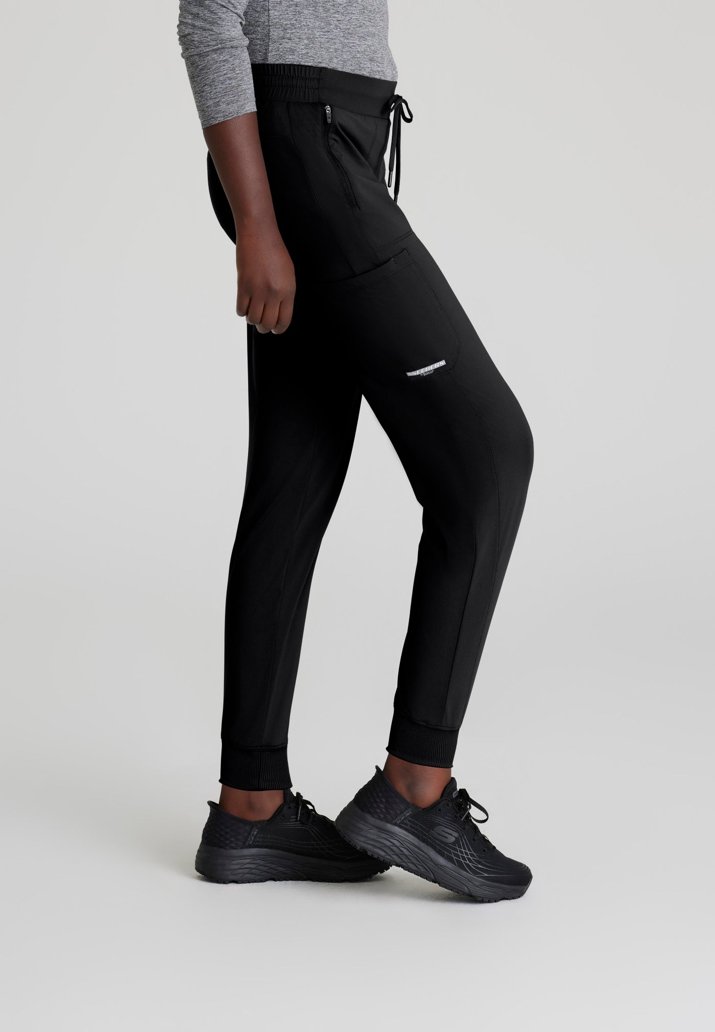 SKP669 Skechers Slip-Ins scrub pant in black. jogger style. stretchable fabric. five pockets. figs medical scrubs.  side image