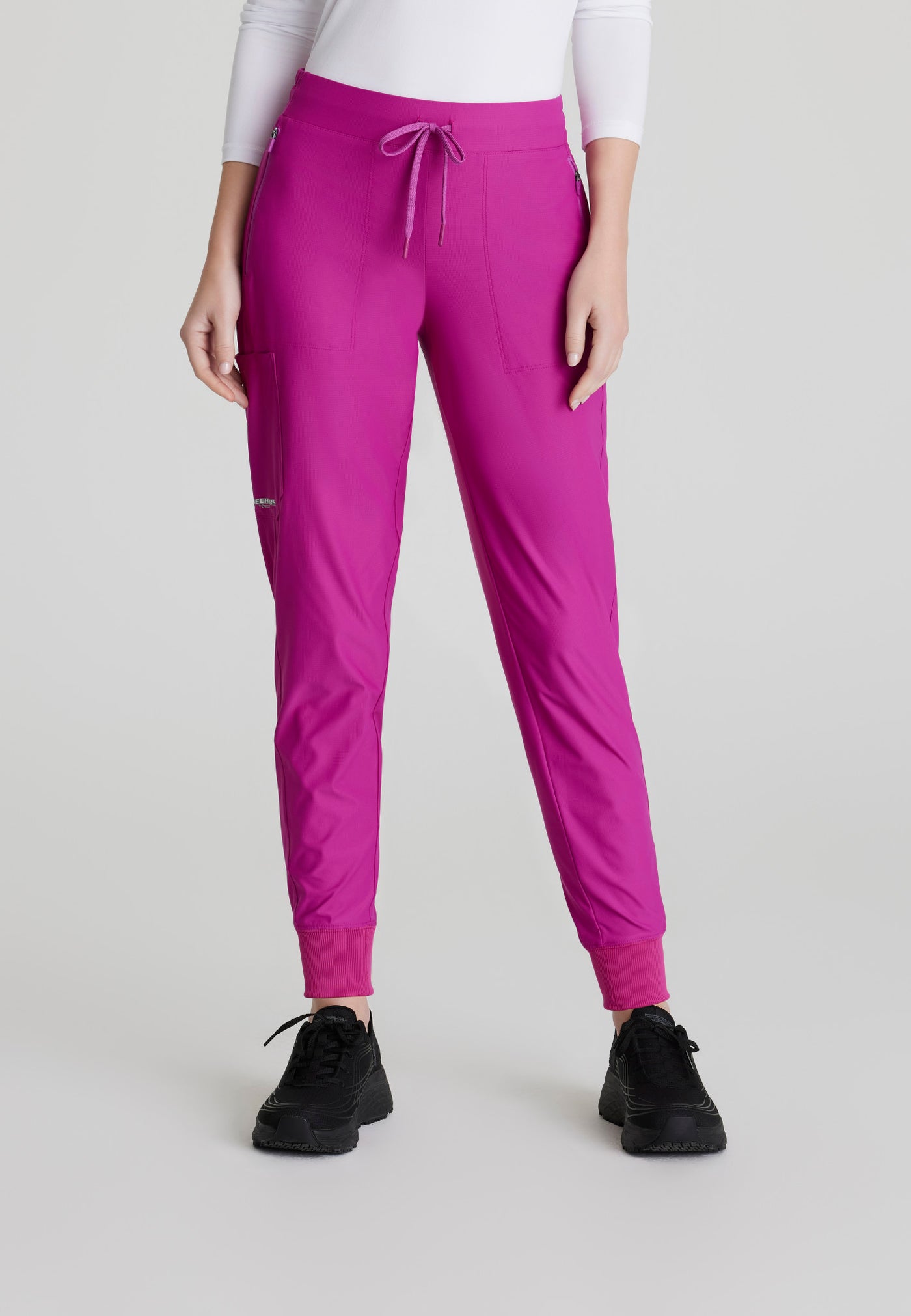 SKP669 Skechers Slip-Ins scrub pant in deep magenta. jogger style. stretchable fabric. five pockets. figs medical scrubs. close up image