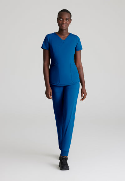 SKT220/SKP669 Skechers Slip-Ins scrub pant in royal. jogger style. stretchable fabric. five pockets. scrubs uniform. full body image