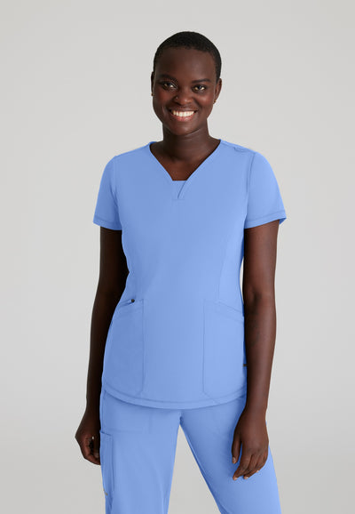 SKT220 Skechers Slip-Ins scrub top in Ceil. three pockets. stretchable fabric. front image