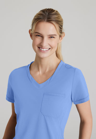 SKT221 Skechers Slip-Ins scrub top in ceil. tuckable. one top pocket. women's. stretchable fabric. close up image