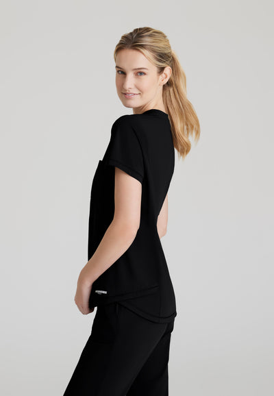 SKT221 Skechers Slip-Ins scrub top in black. tuckable. one top pocket. women's scrub uniforms. stretchable fabric. side image