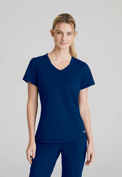 SKT221 Skechers Slip-Ins scrub top in navy. tuckable. one top pocket. women's. stretchable fabric. front image